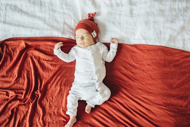 Copper Pearl Knit Swaddle Blanket | Rust