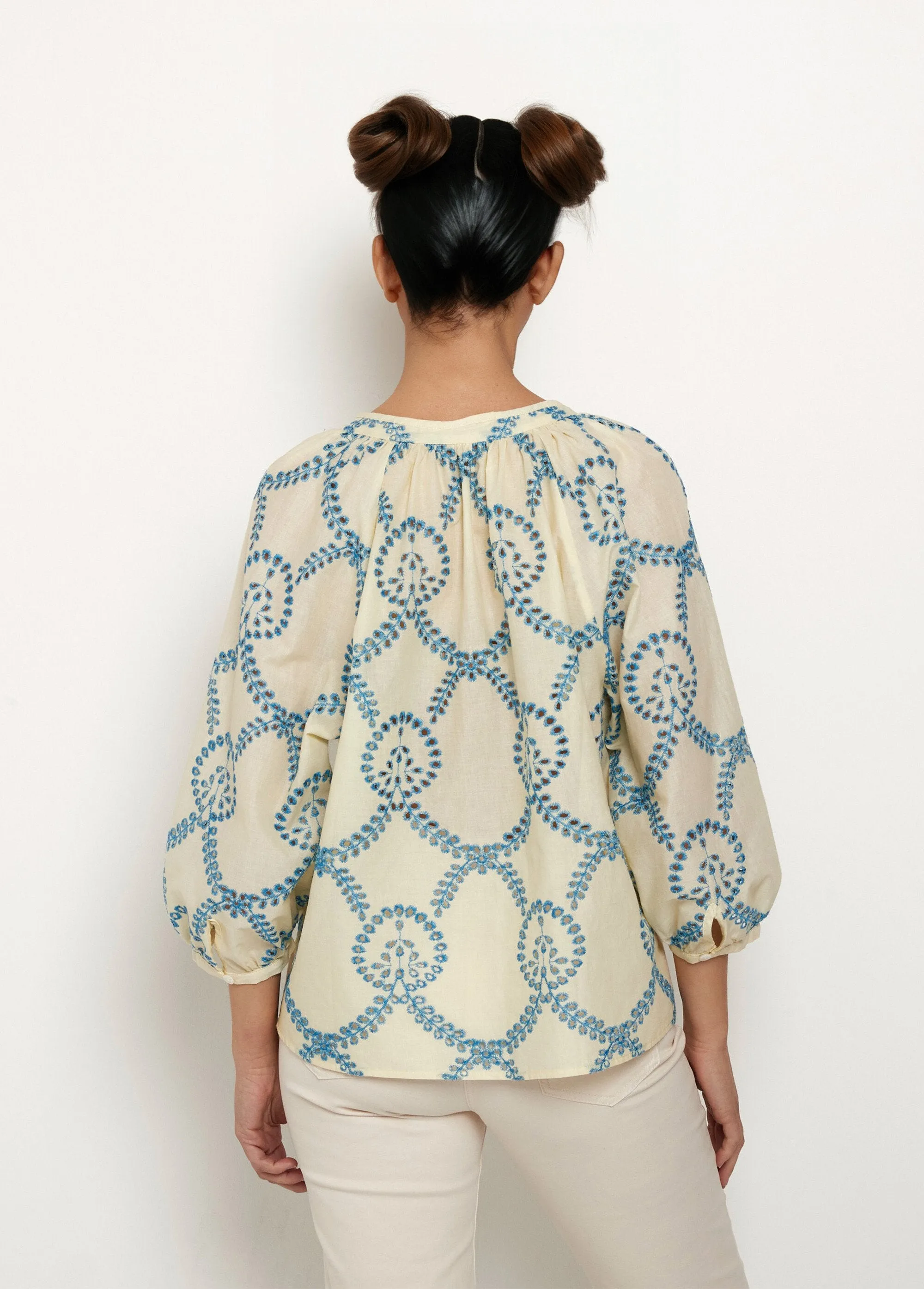 Loose blouse with openwork embroidery and 3/4 sleeves