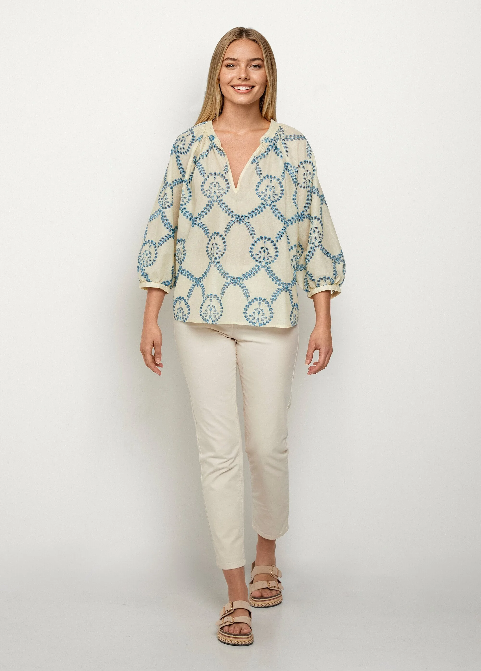 Loose blouse with openwork embroidery and 3/4 sleeves